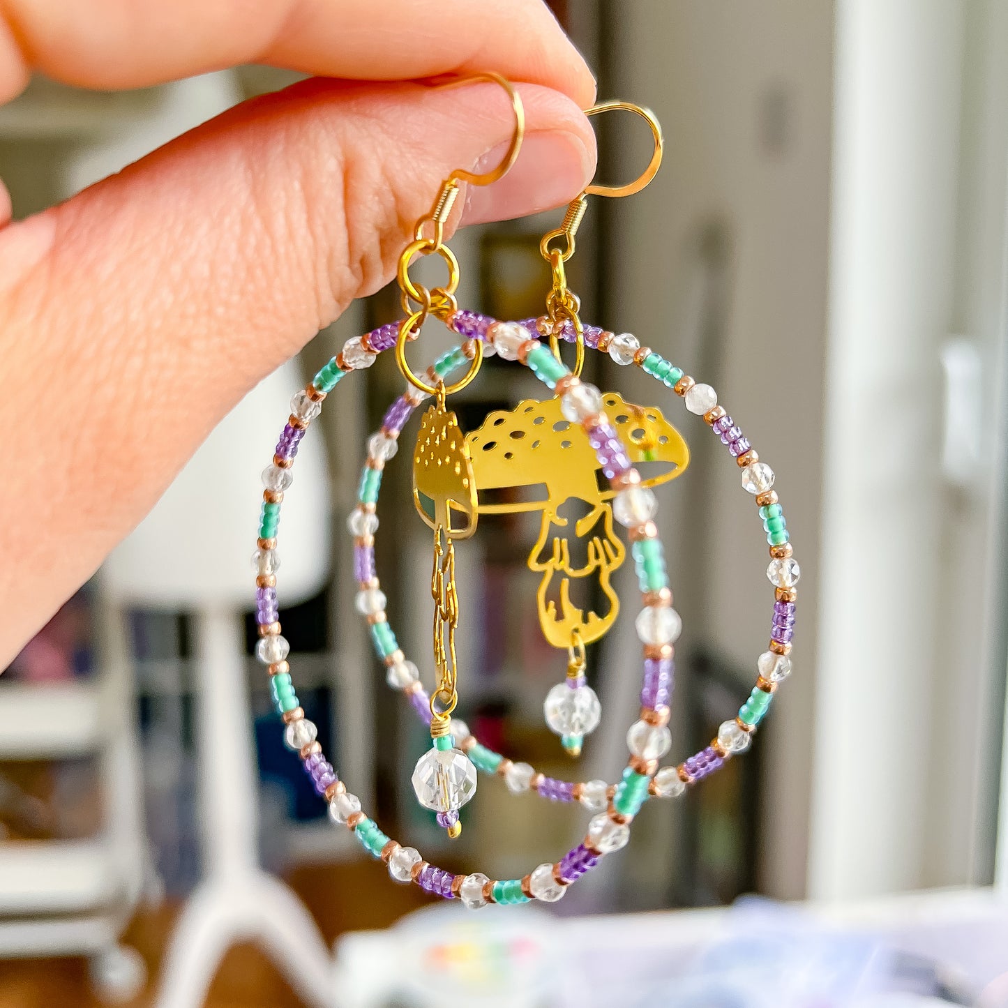 Golden mushroom, clear quartz, purple and green starment hoop earrings