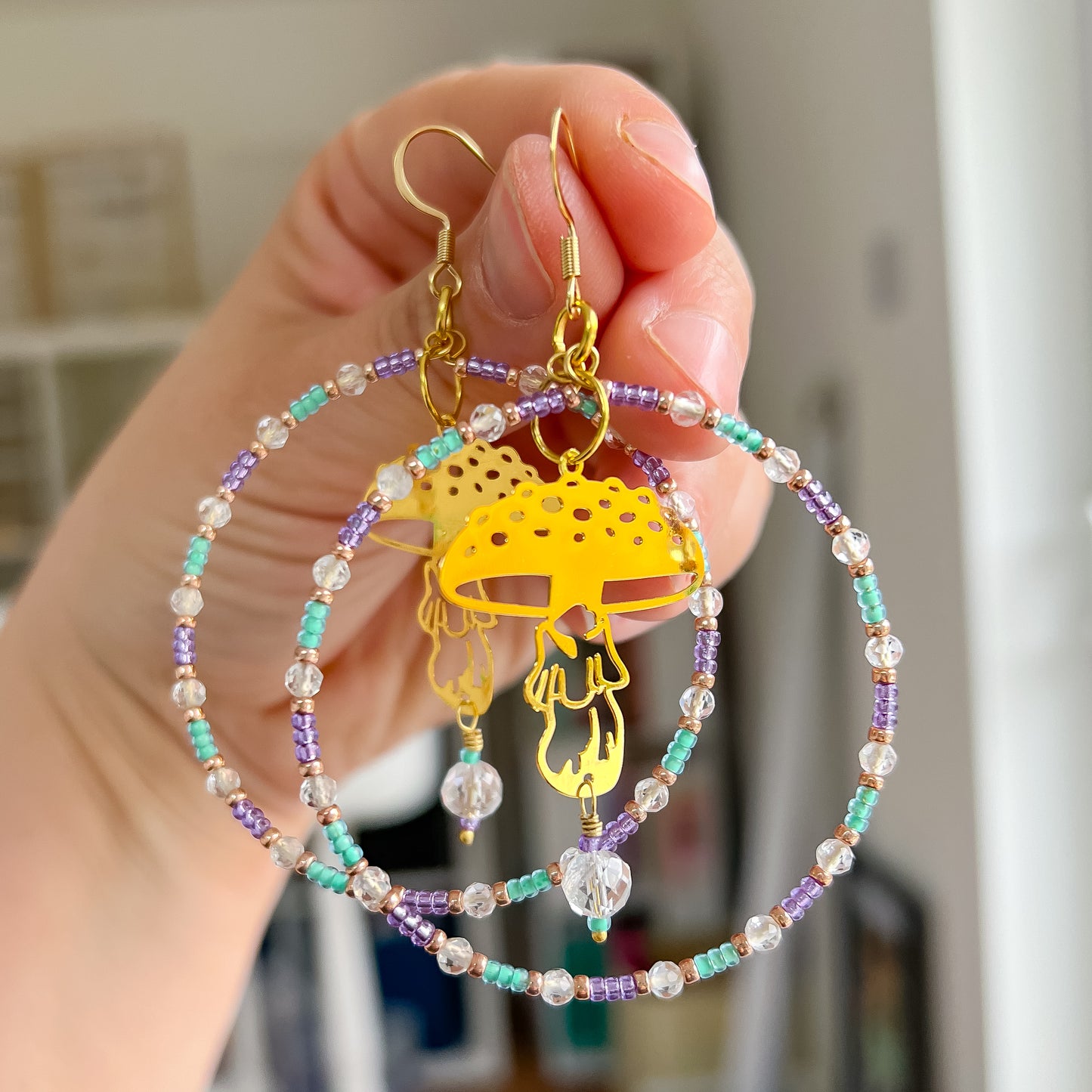 Golden mushroom, clear quartz, purple and green starment hoop earrings