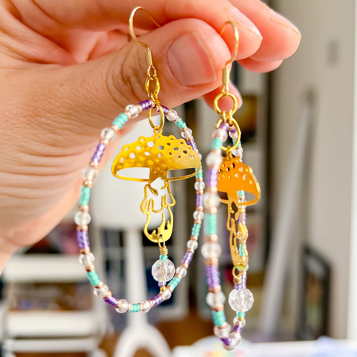Golden mushroom, clear quartz, purple and green starment hoop earrings