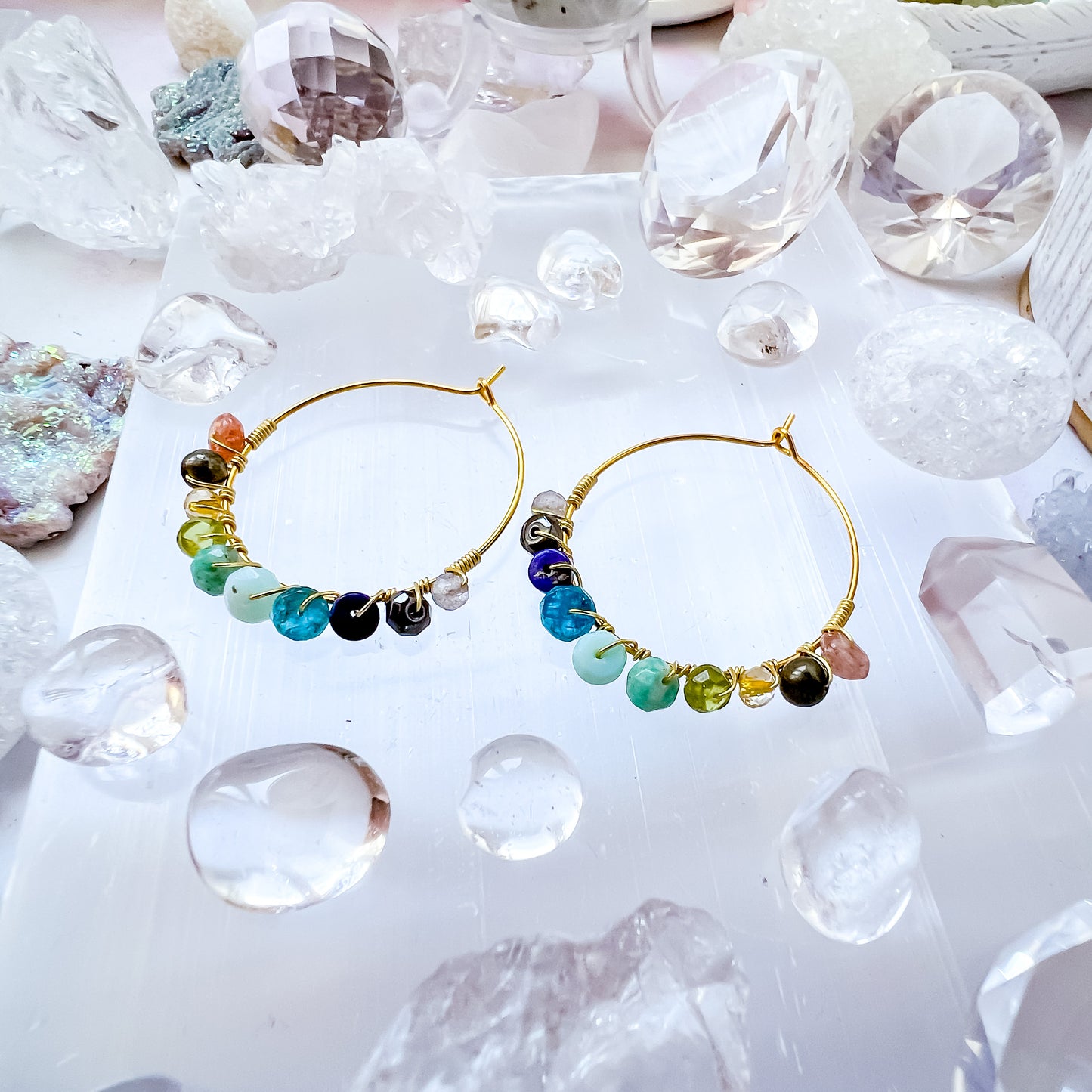 . Lionsgate portal earrings in gold