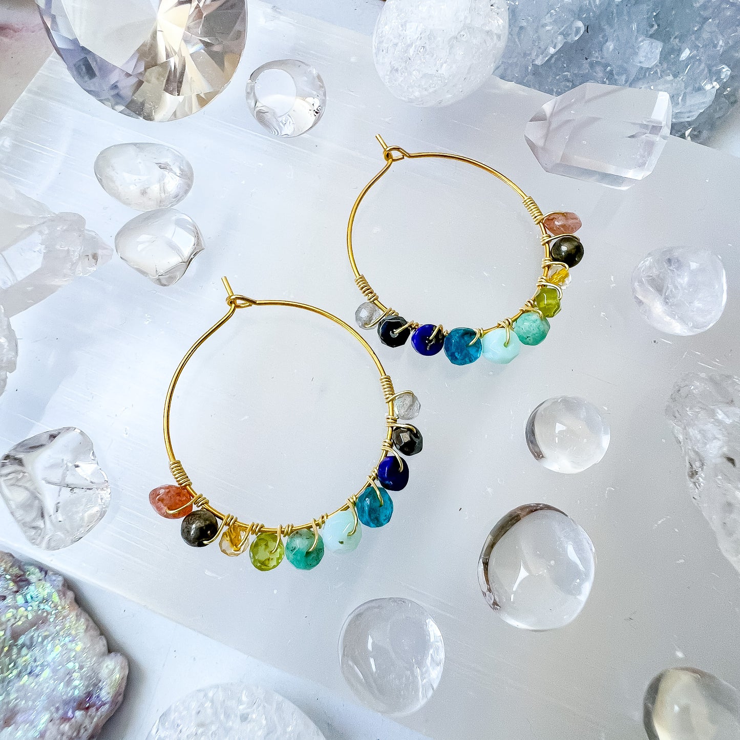 . Lionsgate portal earrings in gold