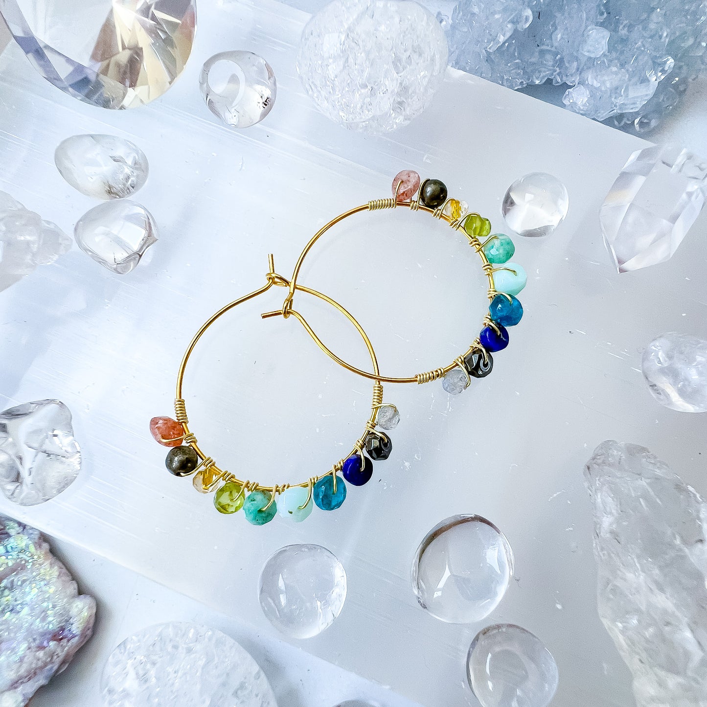 . Lionsgate portal earrings in gold