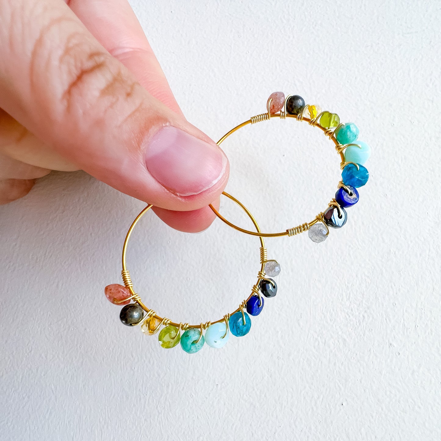 . Lionsgate portal earrings in gold