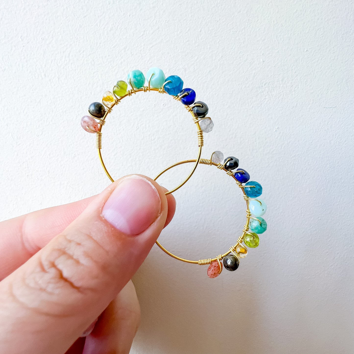 . Lionsgate portal earrings in gold