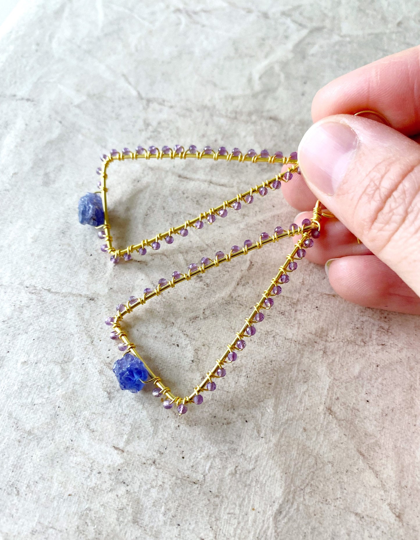 Tanzanite and Amethyst triangle earrings in gold