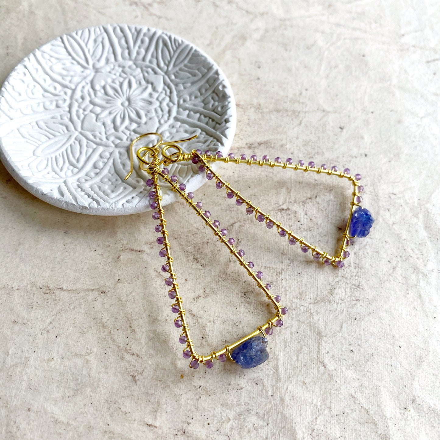 Tanzanite and Amethyst triangle earrings in gold