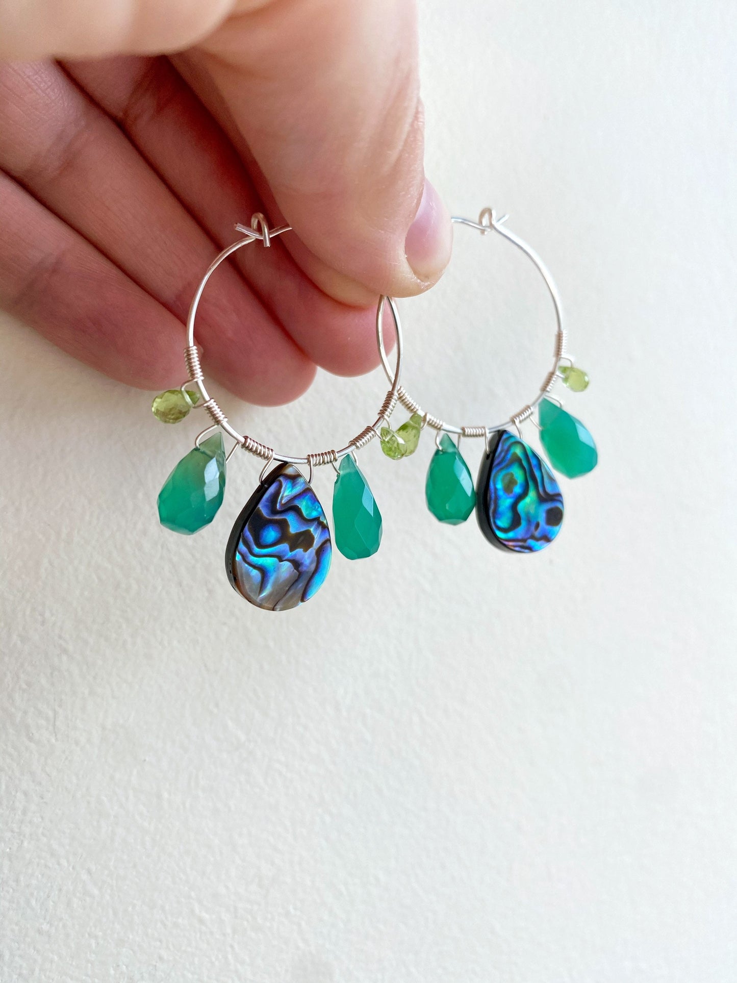 Peacock feather earrings with abalone, green onyx and peridot