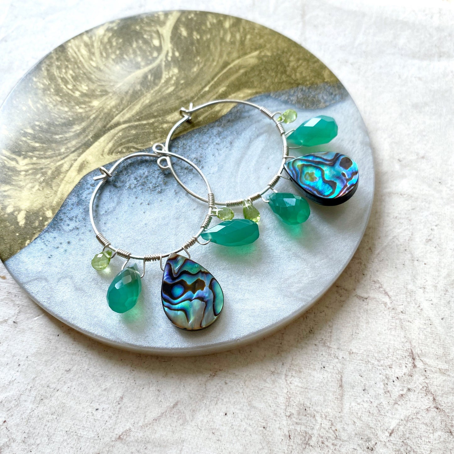 Peacock feather earrings with abalone, green onyx and peridot