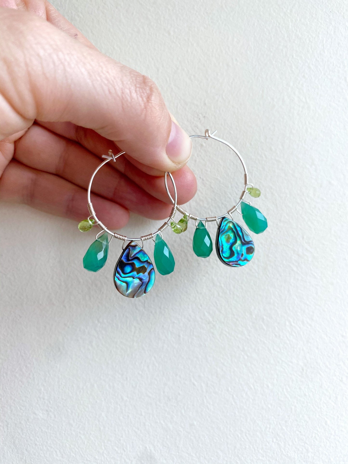 Peacock feather earrings with abalone, green onyx and peridot