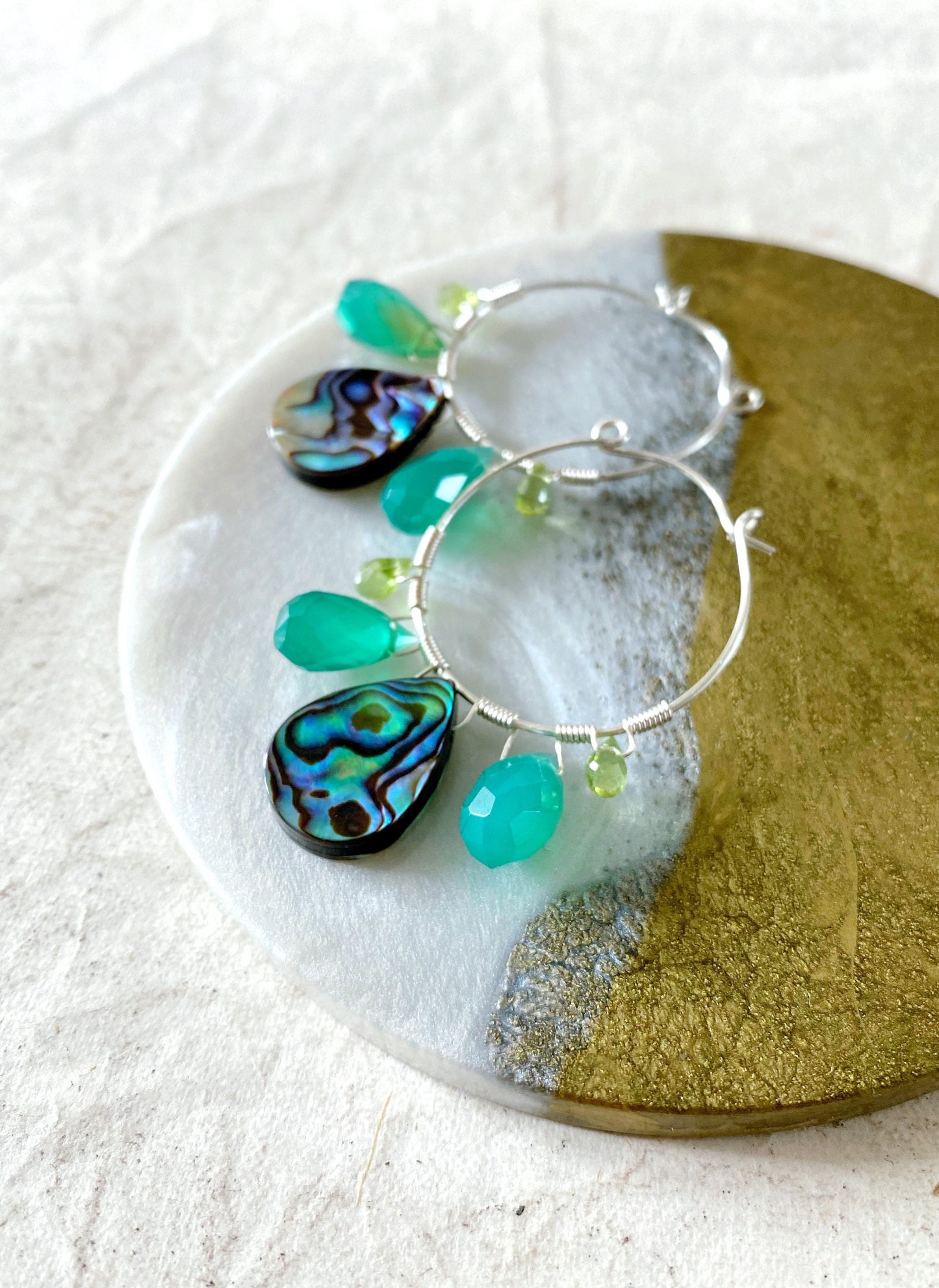 Peacock feather earrings with abalone, green onyx and peridot