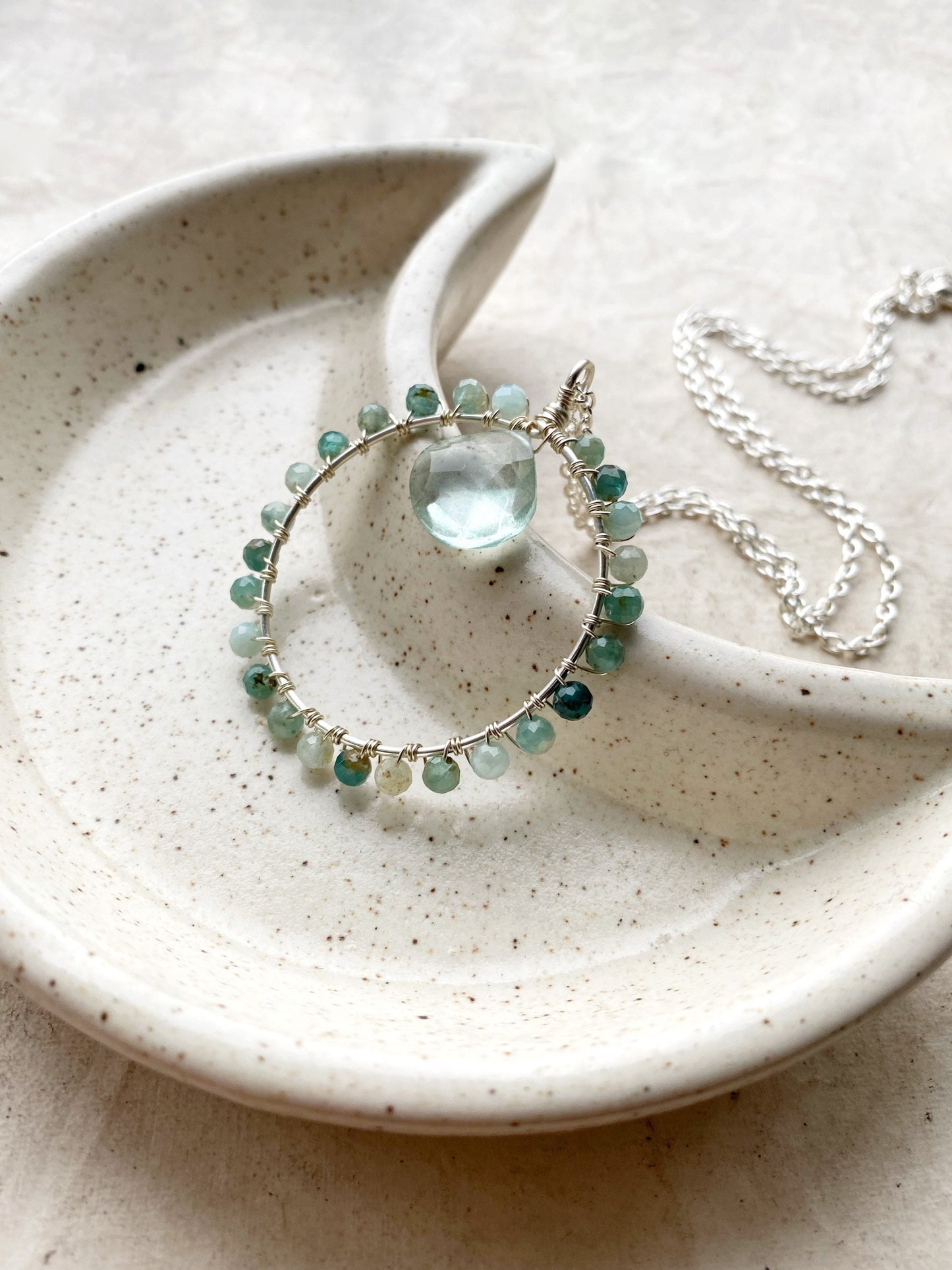 Grandidierite and green quartz crystal circle necklace