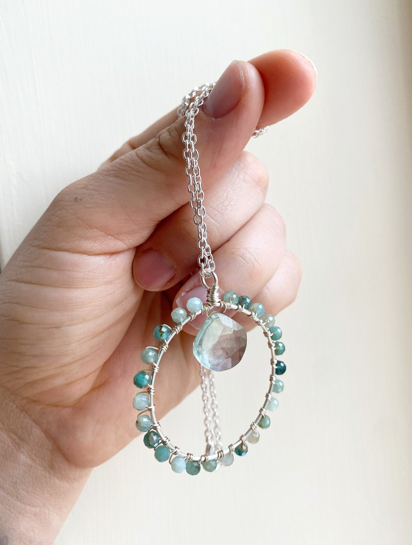Grandidierite and green quartz crystal circle necklace