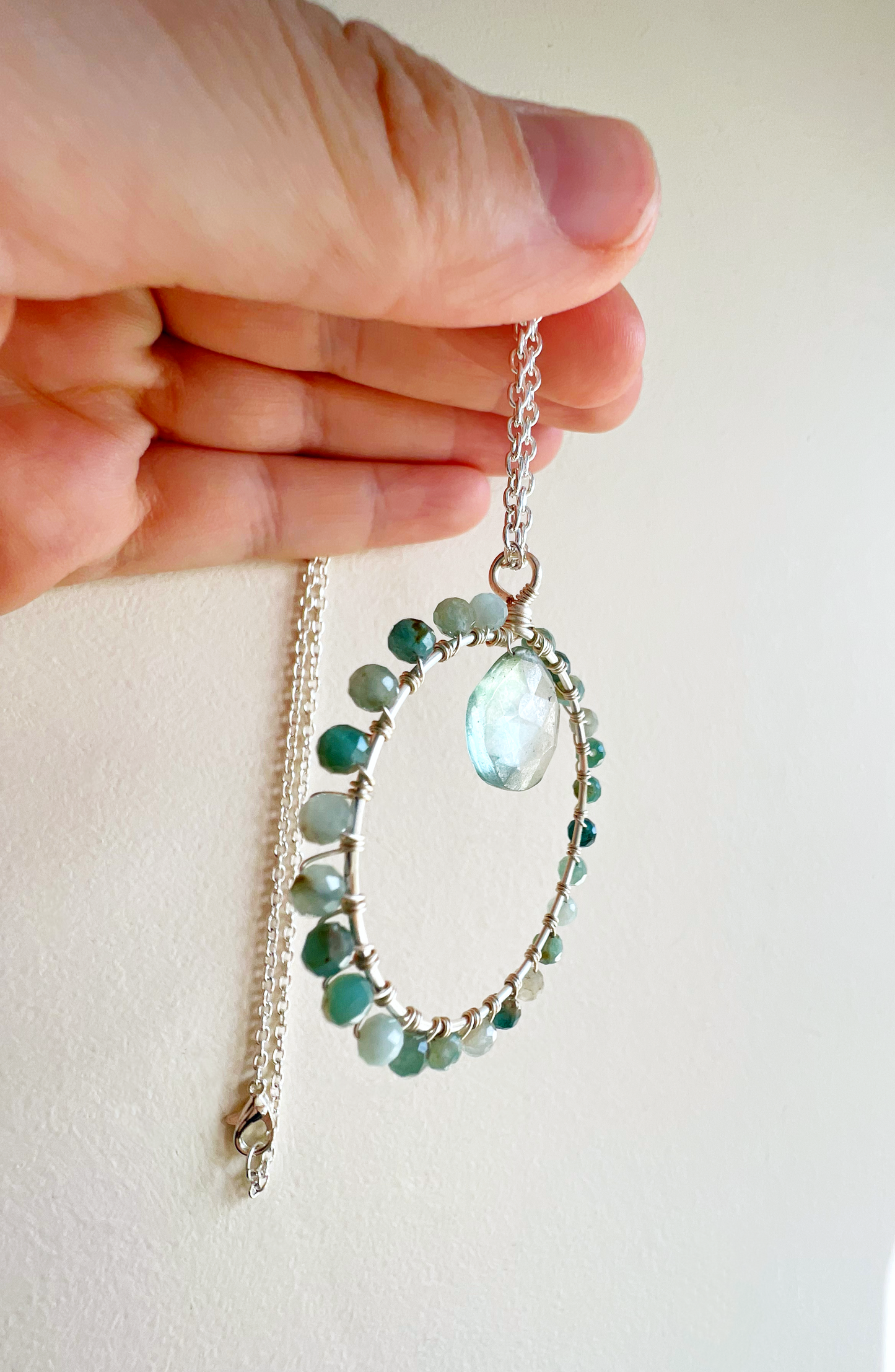 Grandidierite and green quartz crystal circle necklace