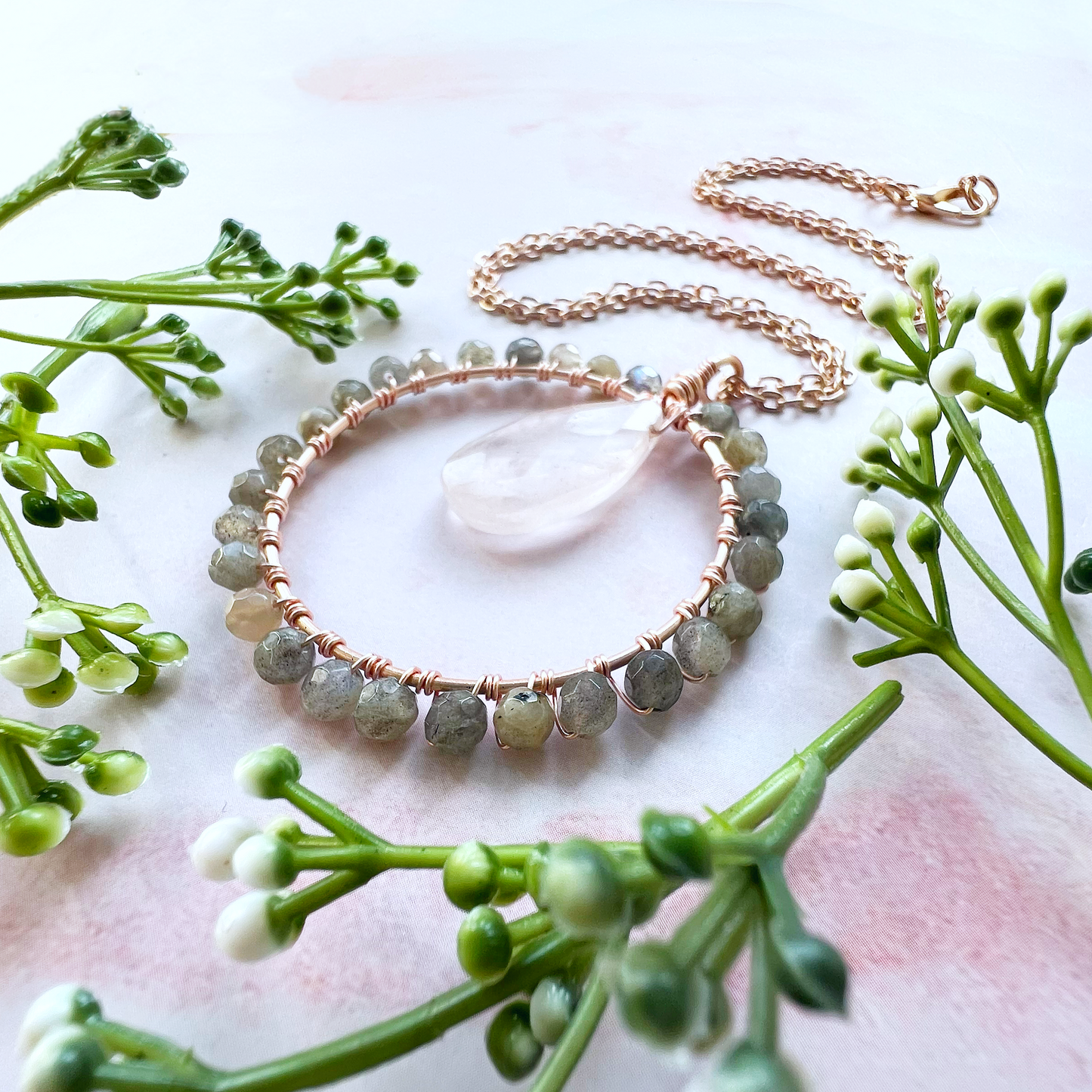 Rose quartz and labradorite Crystal Circle Necklace on rose