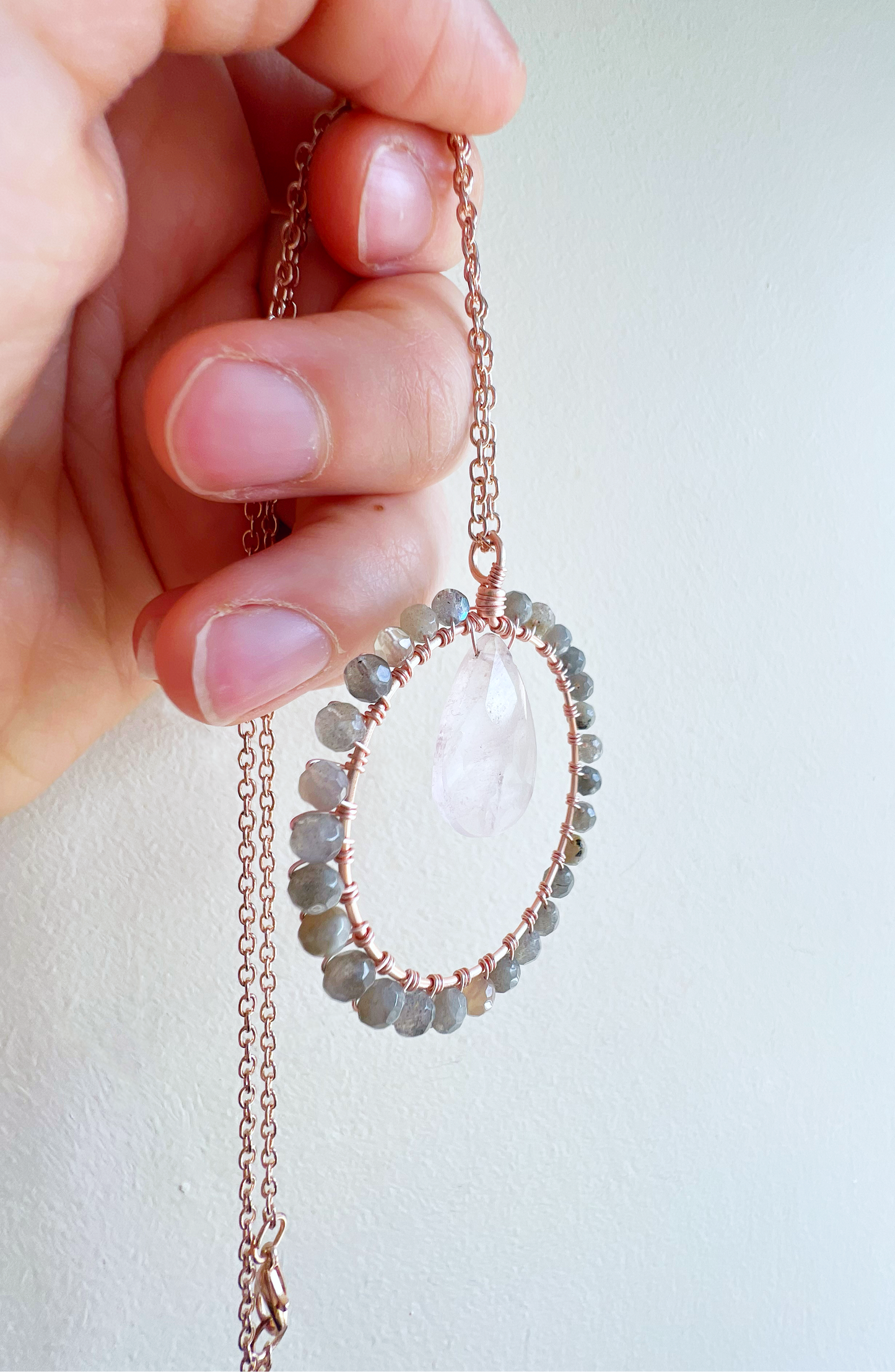 Rose quartz and labradorite Crystal Circle Necklace on rose