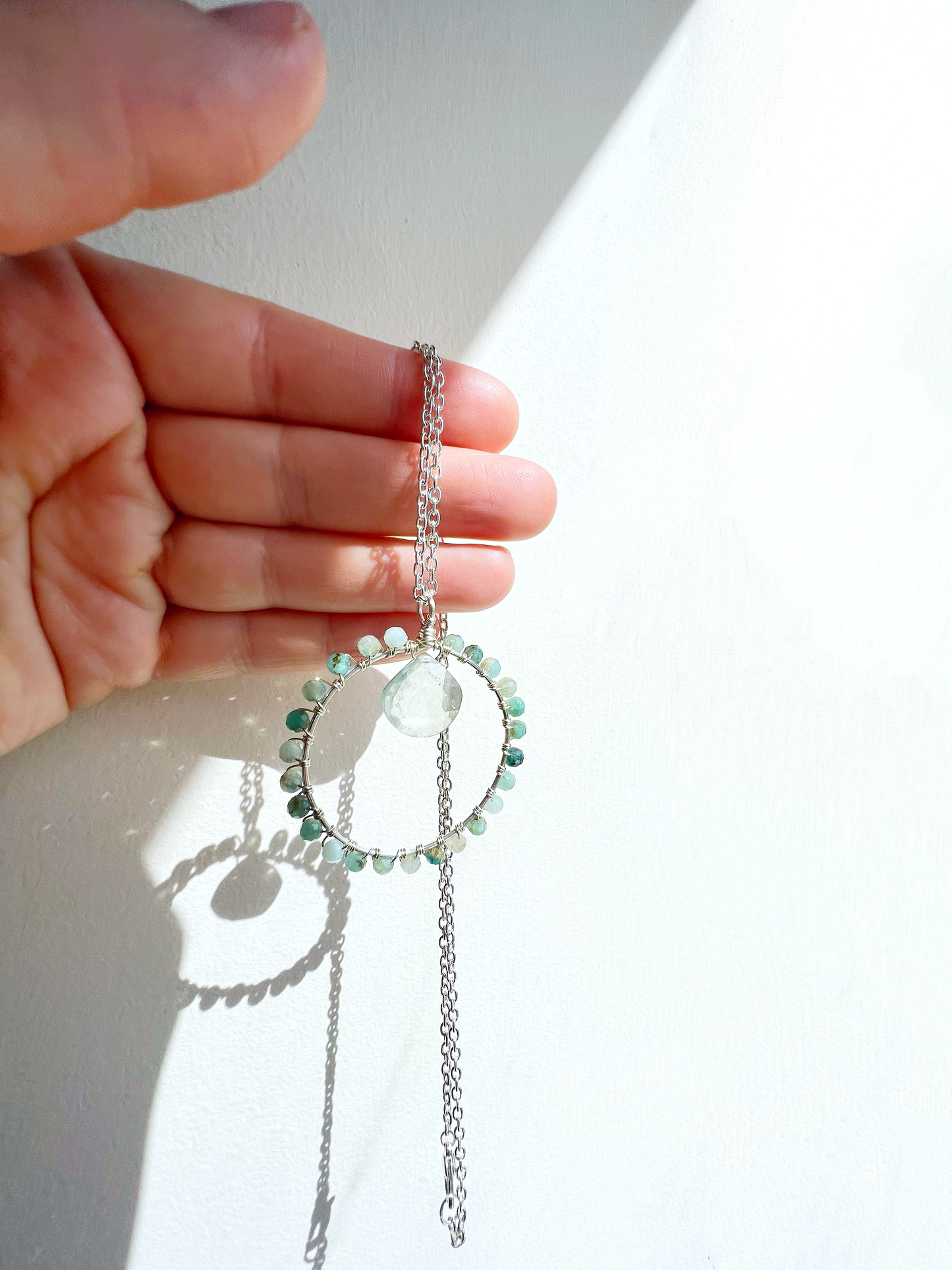 Grandidierite and green quartz crystal circle necklace