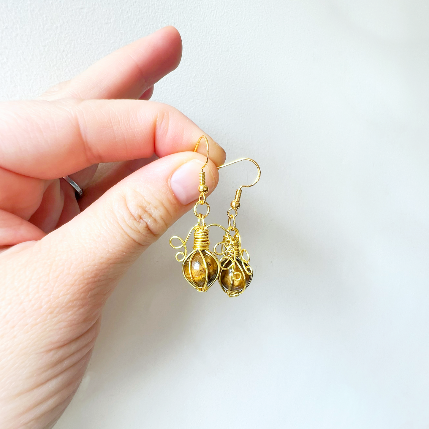 Tigers eye pumpkin earrings in gold