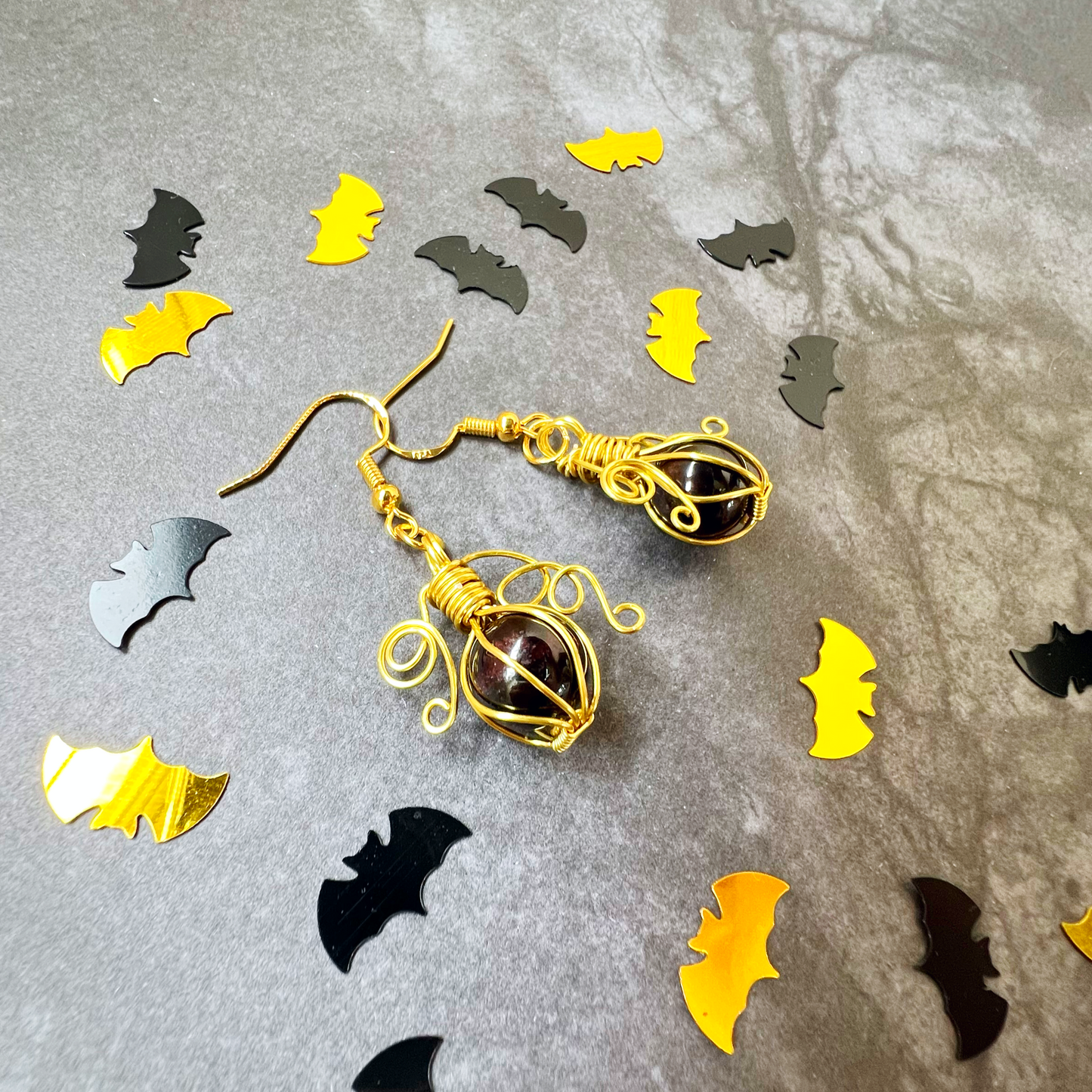 Garnet pumpkin earrings in gold