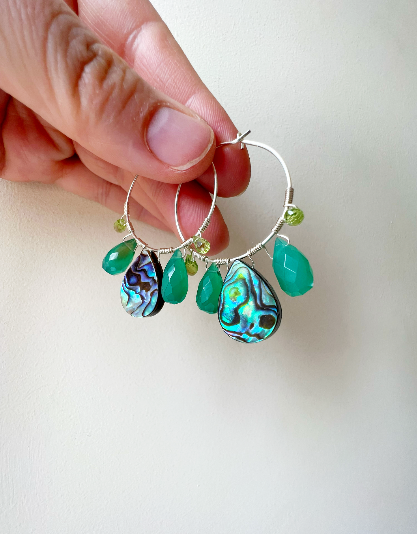 Peacock feather earrings with abalone, green onyx and peridot