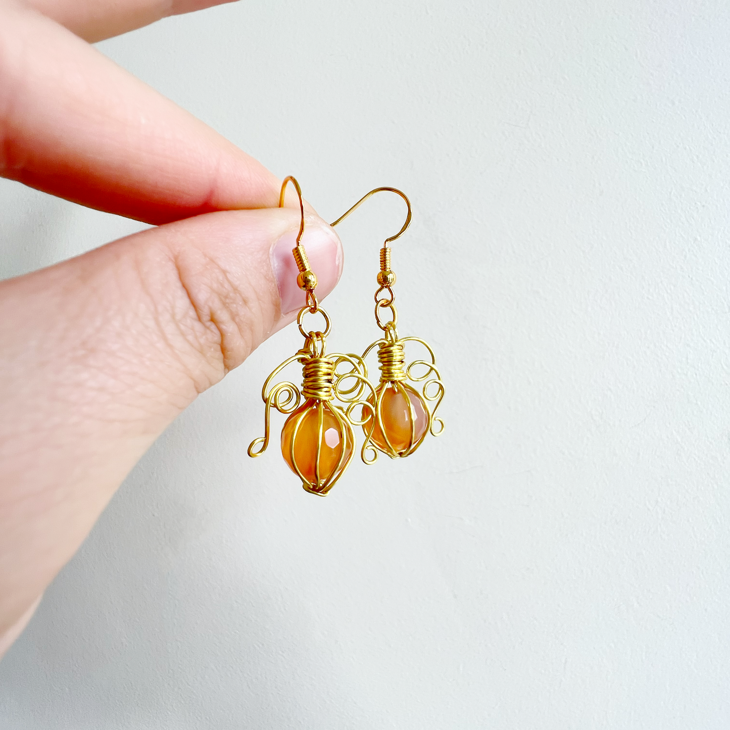 Carnelian pumpkin earrings in gold
