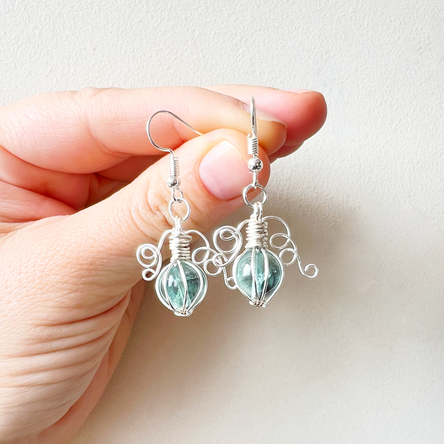 Green fluorite pumpkin earrings in silver