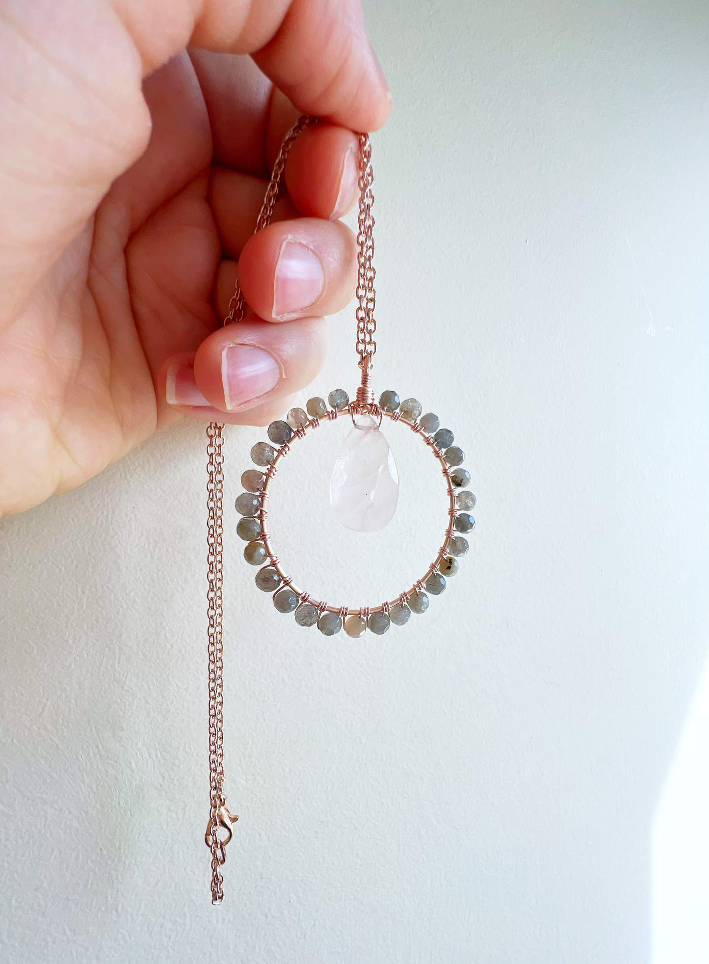 Rose quartz and labradorite Crystal Circle Necklace on rose