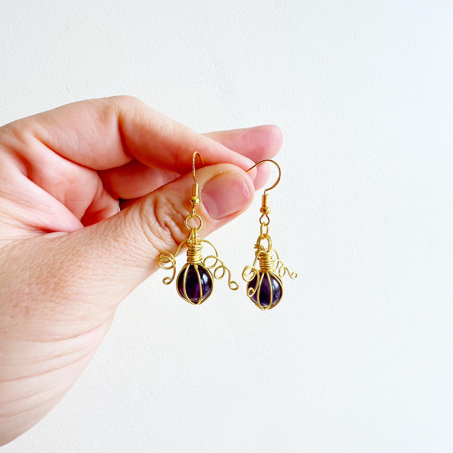 Amethyst pumpkin earrings in gold