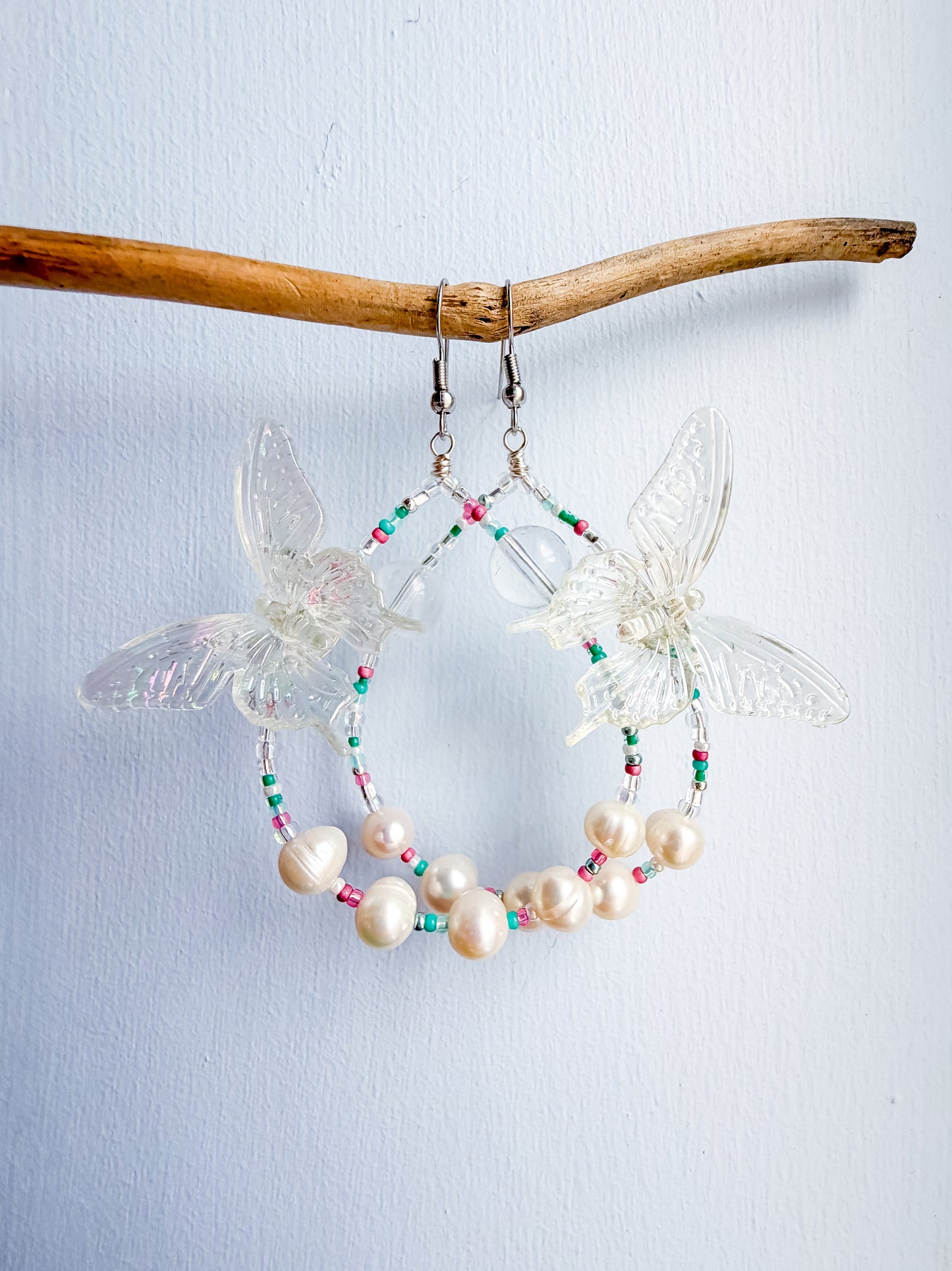 First Flutter - Clear quartz and iridescent butterfly + pearl & teal & pink seed bead earrings