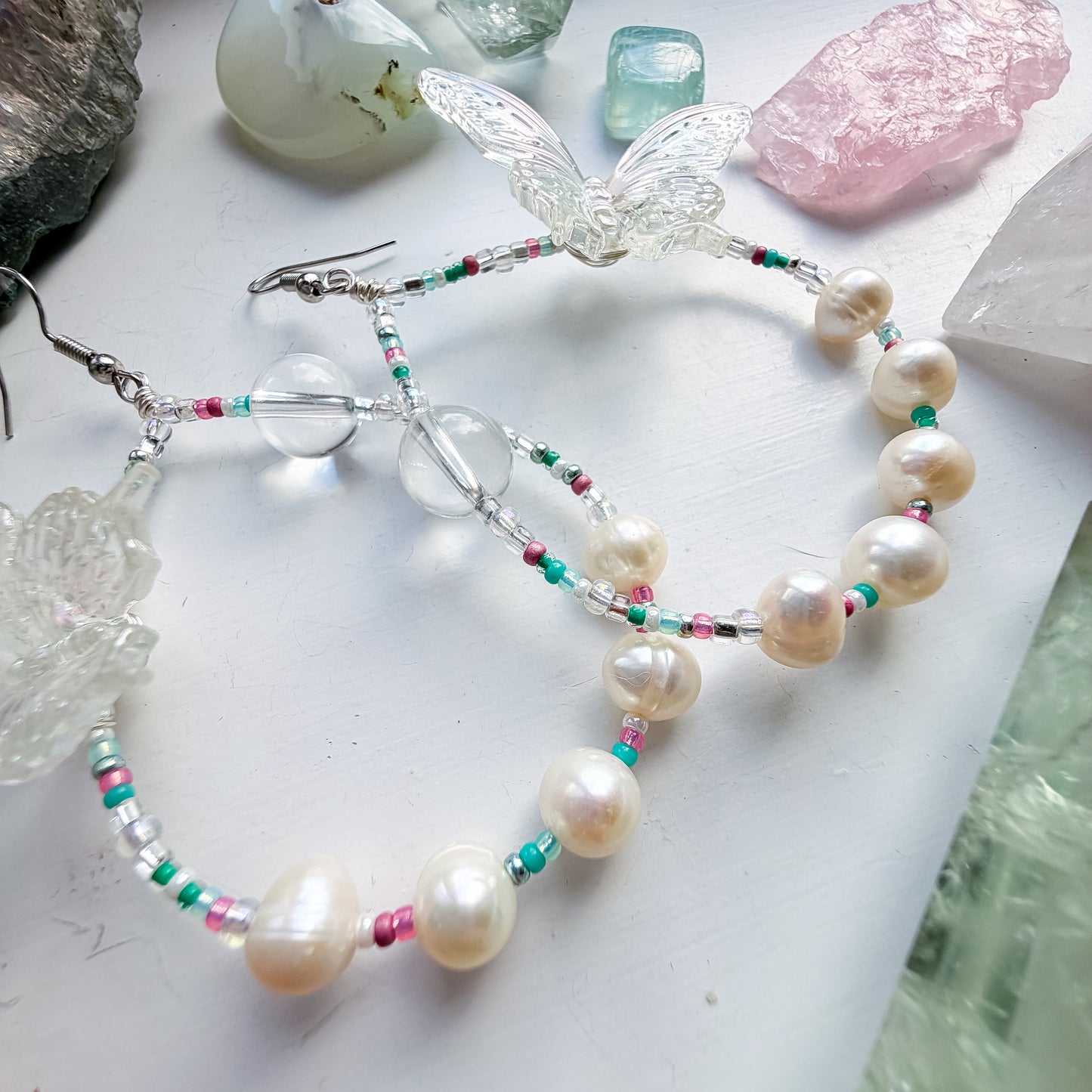 First Flutter - Clear quartz and iridescent butterfly + pearl & teal & pink seed bead earrings