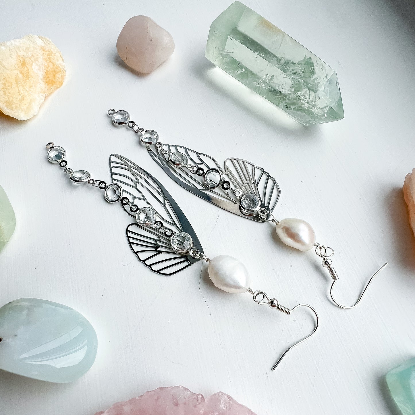 .🦋 Pearl glimmer-wing earrings - silver