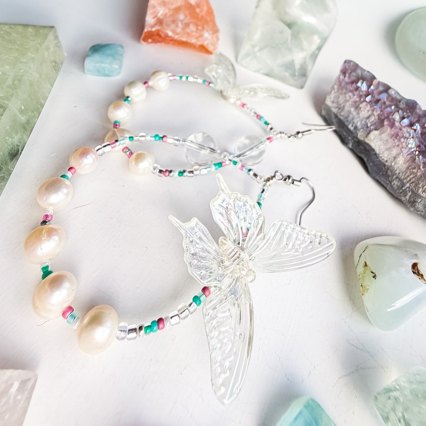 First Flutter - Clear quartz and iridescent butterfly + pearl & teal & pink seed bead earrings