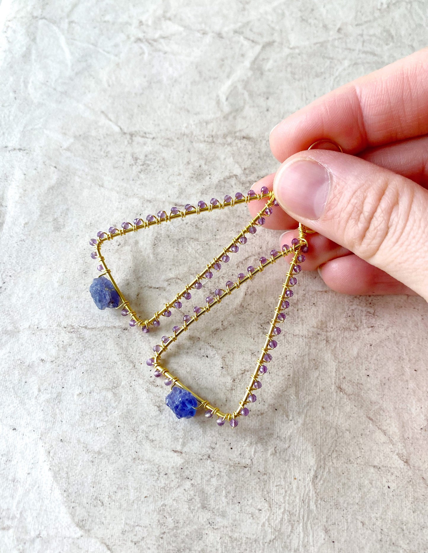 Tanzanite and Amethyst triangle earrings in gold