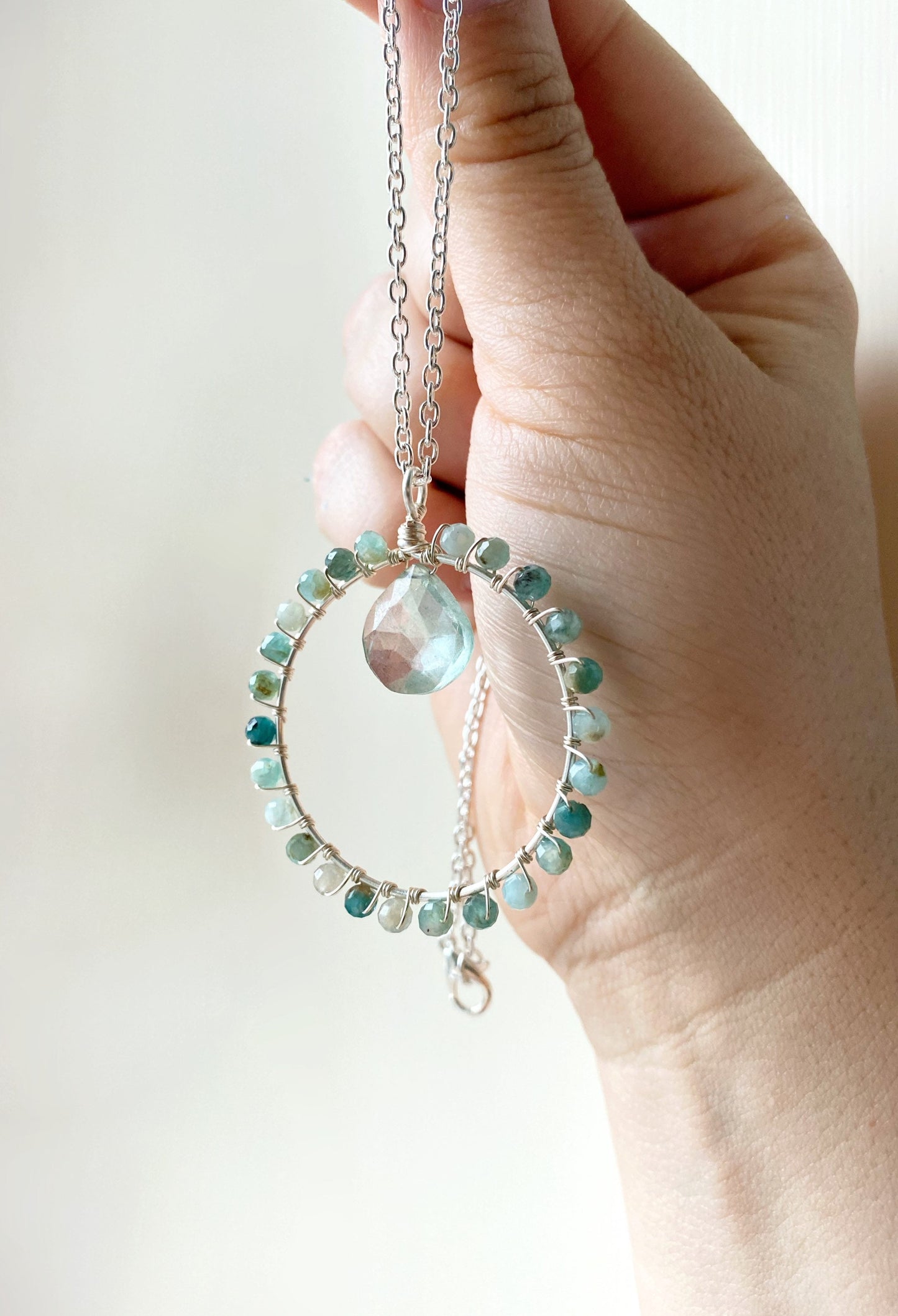 Grandidierite and green quartz crystal circle necklace