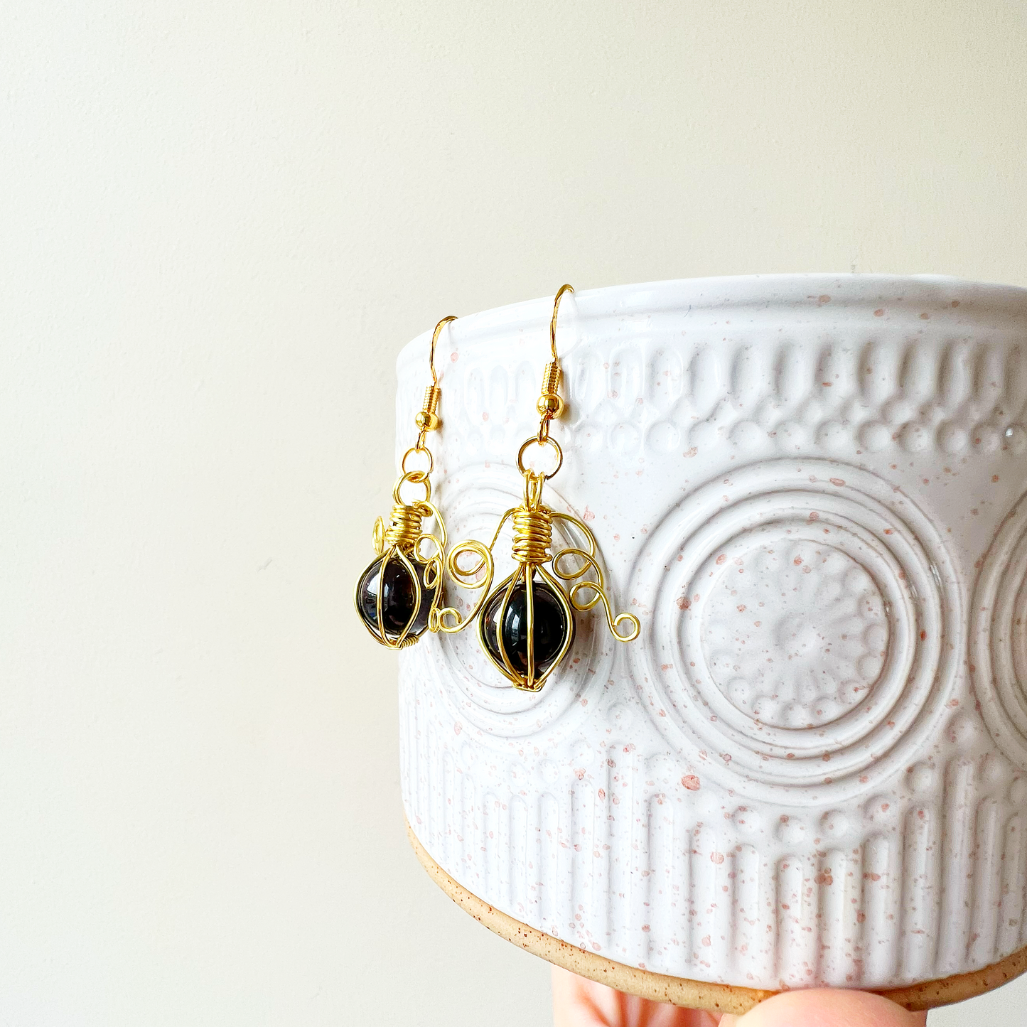 Garnet pumpkin earrings in gold