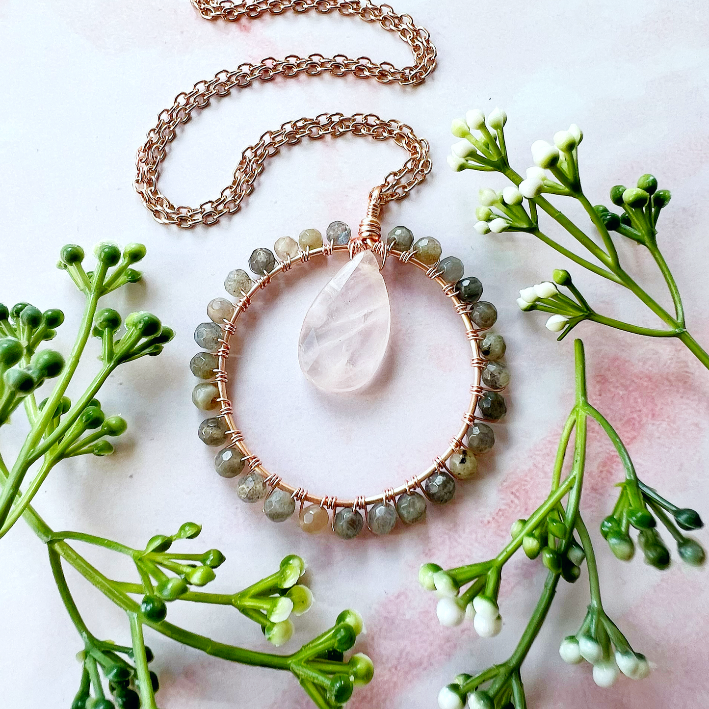 Rose quartz and labradorite Crystal Circle Necklace on rose