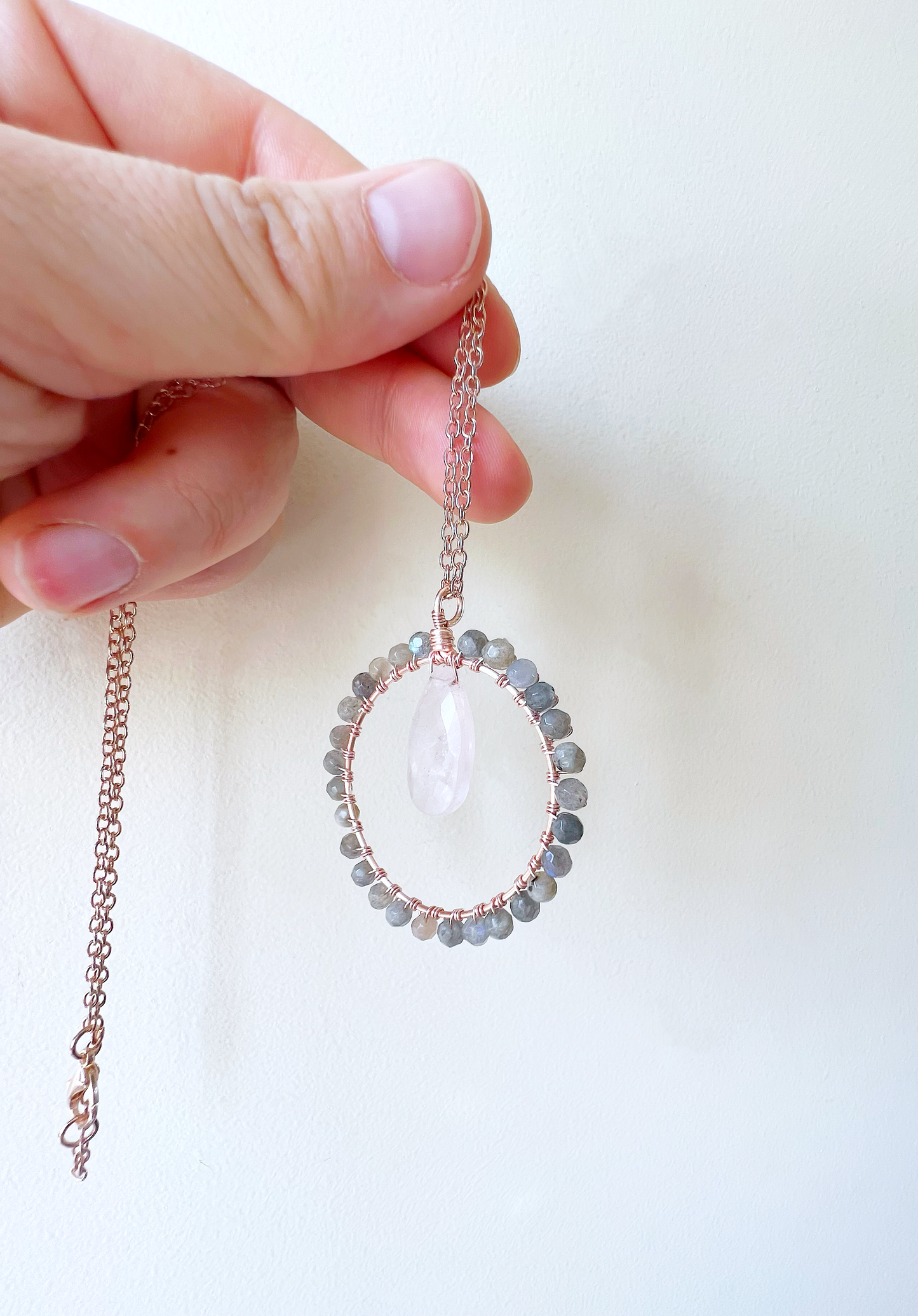 Rose quartz and labradorite Crystal Circle Necklace on rose