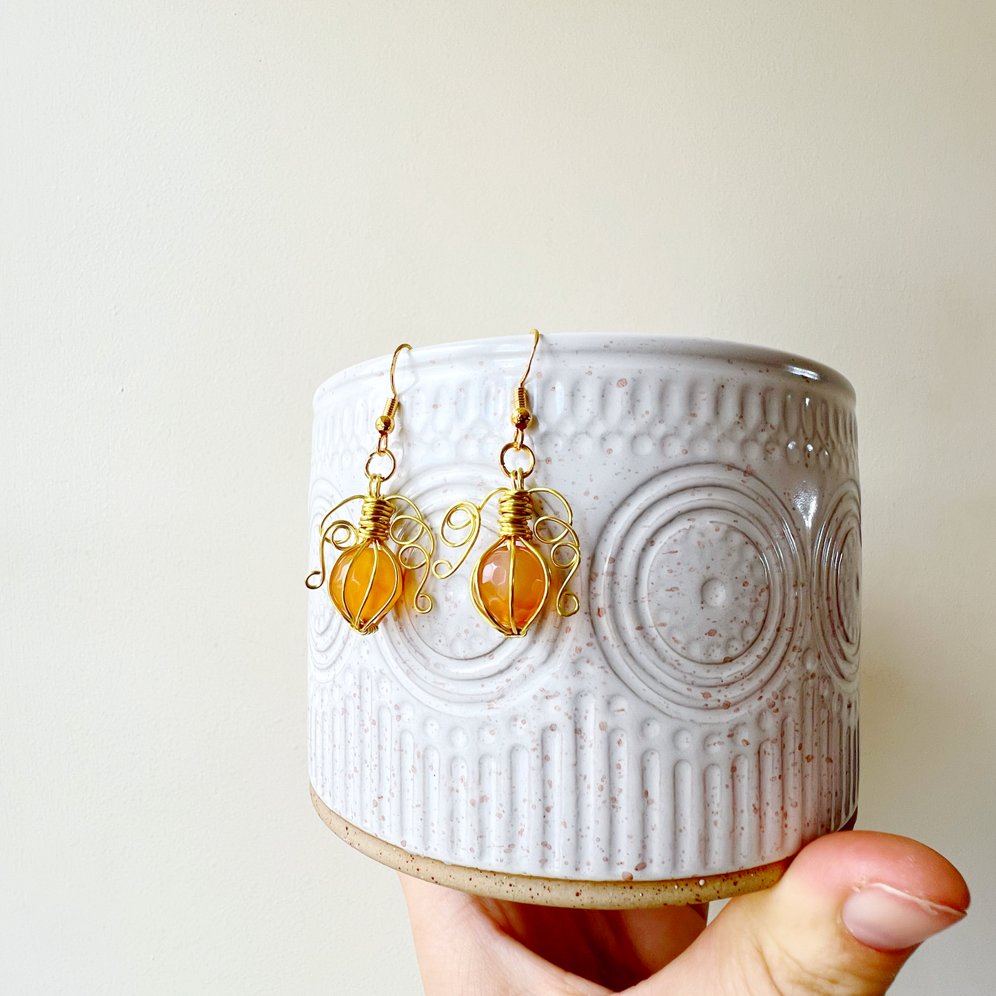 Carnelian pumpkin earrings in gold